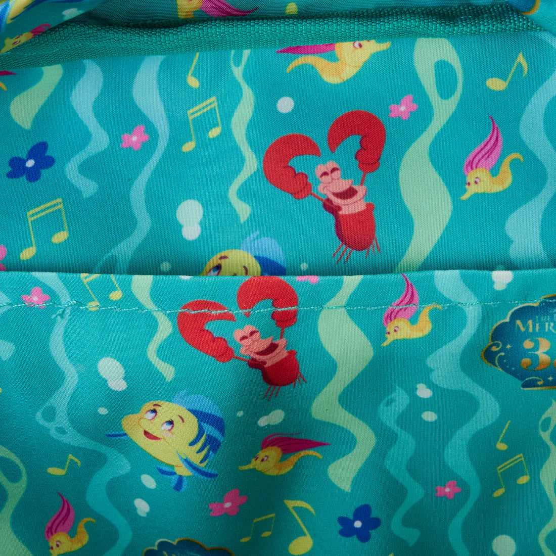 Loungefly Disney Licensed Nylon Mini Backpack for The Little Mermaid 35th Anniversary Featuring 'Life Is The Bubbles' All-Over Print