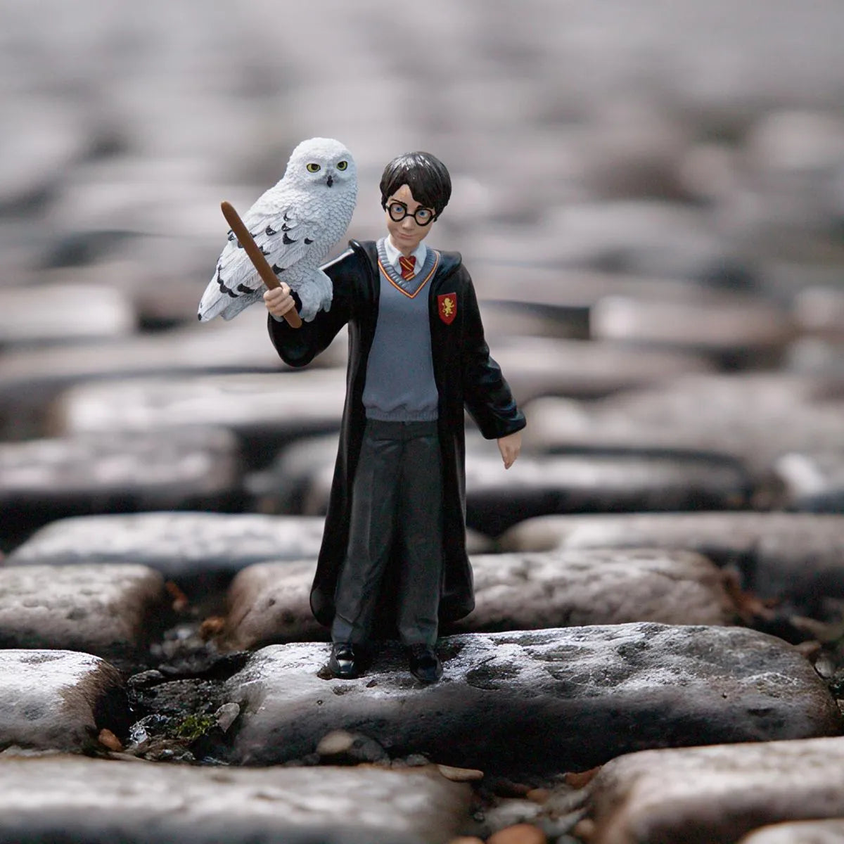 The Magical Duo: Harry Potter and His Faithful Snowy Owl Hedwig Figurine